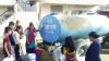 Local women filling water from supply tank 